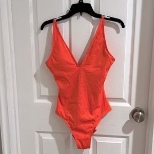 T83 bathing suit plungy size Medium Regular/Long orange